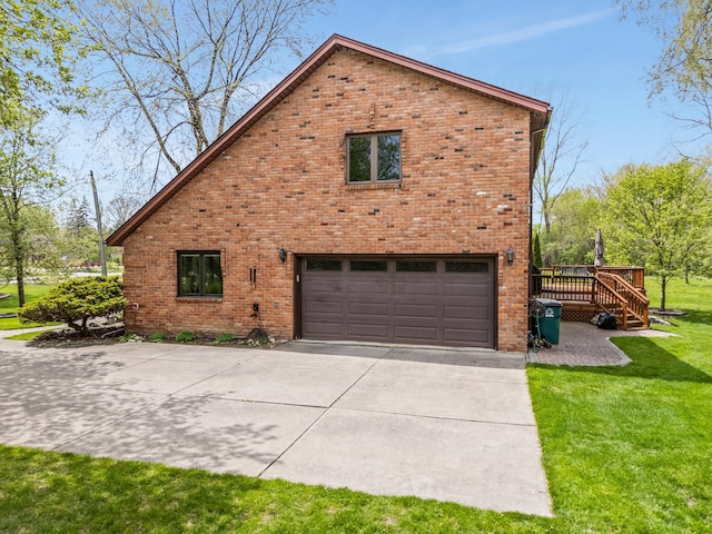 view of side of property featuring brick siding, a garage, a wooden deck, a yard, and driveway