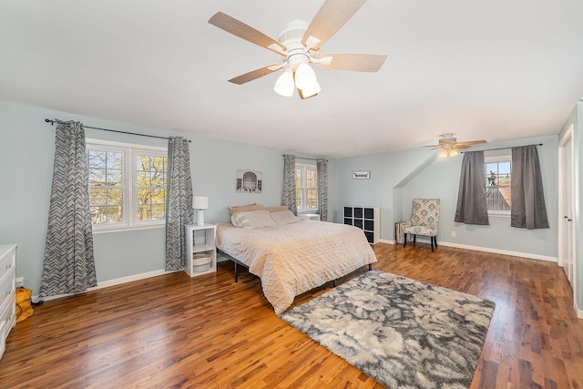 1016 Argyle Ct, Alma, MI 48801 - bedroom featuring baseboards, wood finished floors, and multiple windows