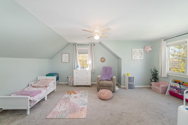 1016 Argyle Ct, Alma, MI 48801 - bedroom with carpet flooring, ceiling fan, vaulted ceiling, and multiple windows