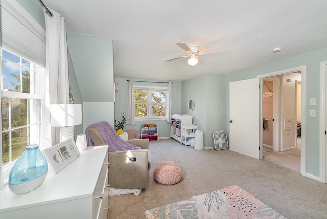 1016 Argyle Ct, Alma, MI 48801 - bedroom featuring a ceiling fan, baseboards, and light carpet