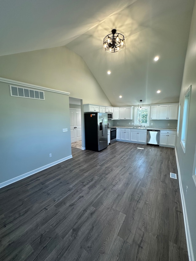 1052 Angle Rd, Lapeer, MI 48446 - kitchen featuring appliances with stainless steel finishes, white cabinets, and visible vents
