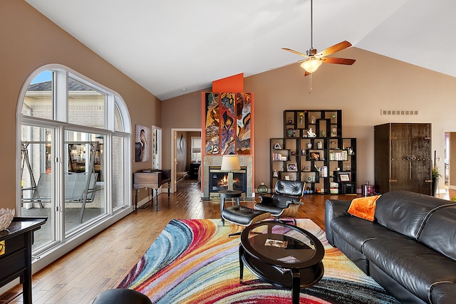 32560 N River Rd, Harrison Township, MI 48045 - living room featuring high vaulted ceiling, a ceiling fan, and hardwood / wood-style floors
