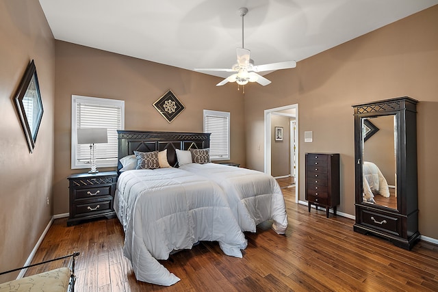 32560 N River Rd, Harrison Township, MI 48045 - bedroom featuring multiple windows, wood-type flooring, baseboards, and ceiling fan