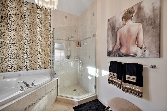 32560 N River Rd, Harrison Township, MI 48045 - full bath featuring a shower stall, a garden tub, tile patterned floors, and a chandelier