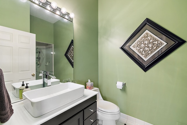 32560 N River Rd, Harrison Township, MI 48045 - full bath with toilet, an enclosed shower, tile patterned floors, and vanity