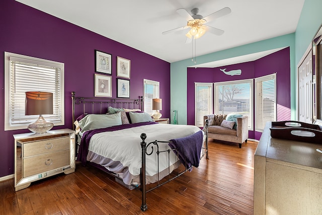 32560 N River Rd, Harrison Township, MI 48045 - bedroom with dark wood finished floors, ceiling fan, and baseboards