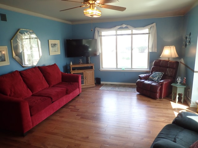 46980 Country Ln Unit 8, Macomb, MI 48044 - living area featuring baseboards, ornamental molding, ceiling fan, and wood finished floors
