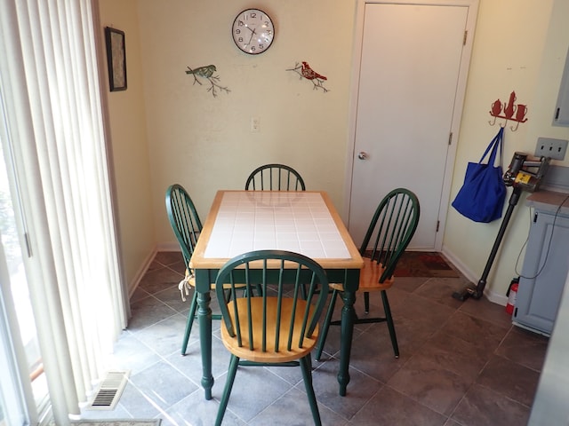46980 Country Ln Unit 8, Macomb, MI 48044 - dining room with tile patterned floors and visible vents