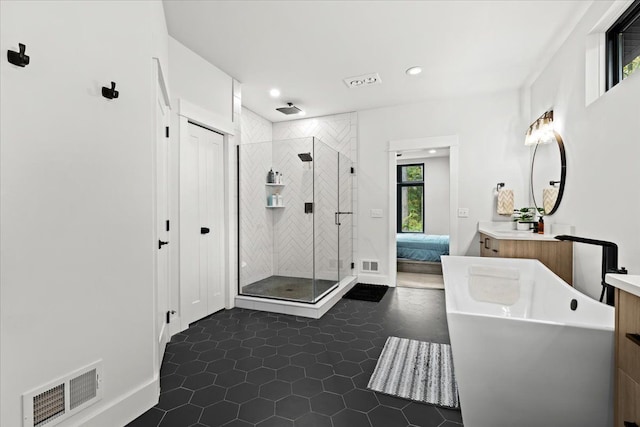 full bath with visible vents, vanity, recessed lighting, tile patterned floors, and a shower stall