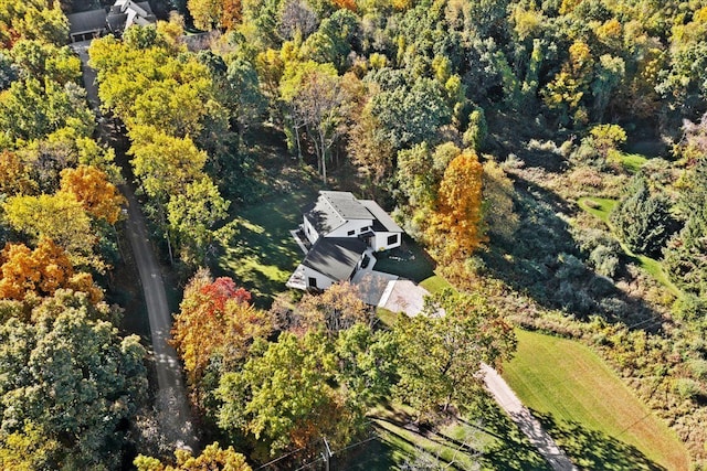 drone / aerial view featuring a view of trees