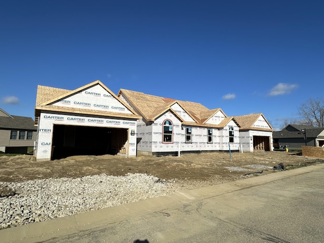 property in mid-construction featuring an attached garage