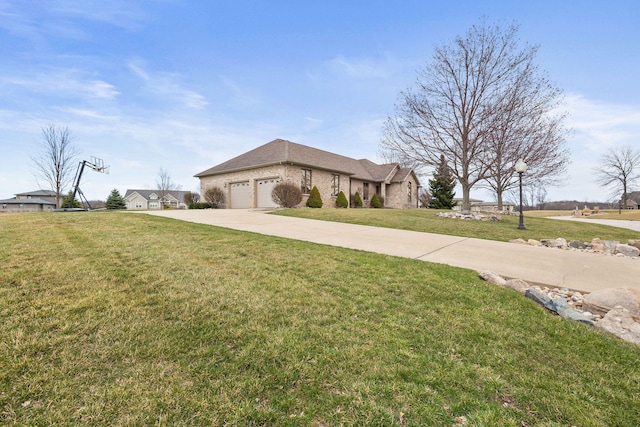 view of front of property with driveway, brick siding, a front lawn, and a garage