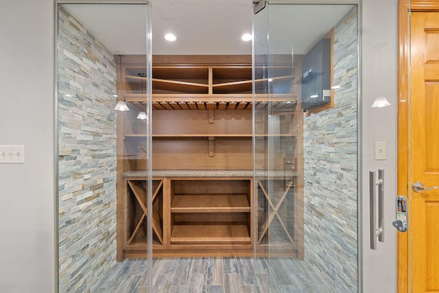 wine area featuring wood finished floors