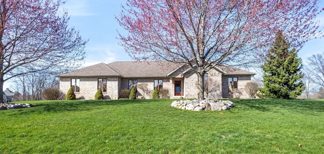 2776 W Hogan Dr, Indiana, IN 46350 - ranch-style home with brick siding and a front yard