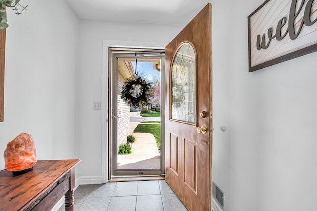 73941 Madison St, Armada, MI 48005 - foyer featuring light tile patterned flooring, baseboards, and visible vents