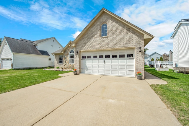 73941 Madison St, Armada, MI 48005 - view of front of house with brick siding, driveway, a front lawn, and a garage