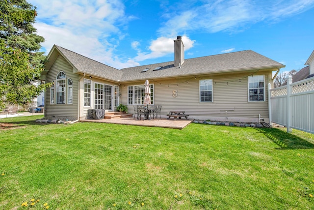 73941 Madison St, Armada, MI 48005 - back of house with fence, a chimney, a yard, and a patio area