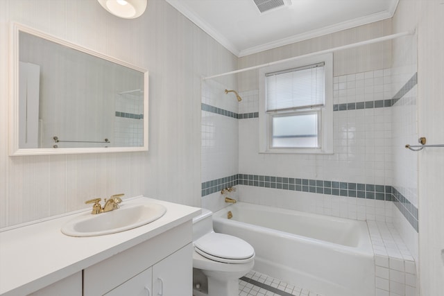 full bathroom with vanity, toilet, crown molding, visible vents, and tub / shower combination