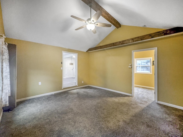unfurnished room featuring carpet floors, a ceiling fan, baseboards, and vaulted ceiling with beams