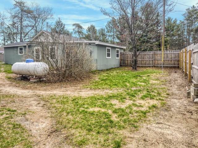 view of yard with a fenced backyard