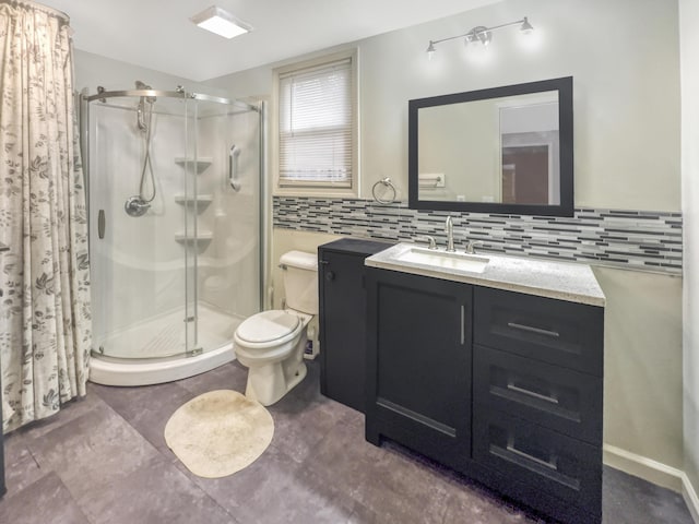 full bath featuring vanity, tasteful backsplash, toilet, and a shower stall