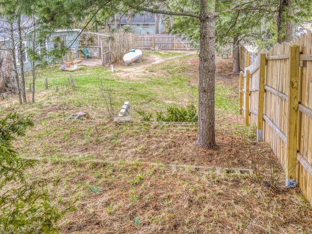 view of yard featuring a fenced backyard