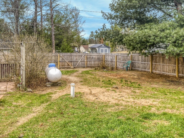 view of yard featuring a fenced backyard