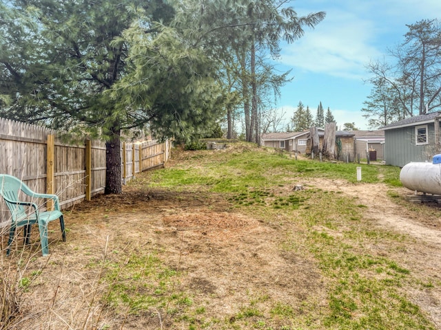 view of yard with fence