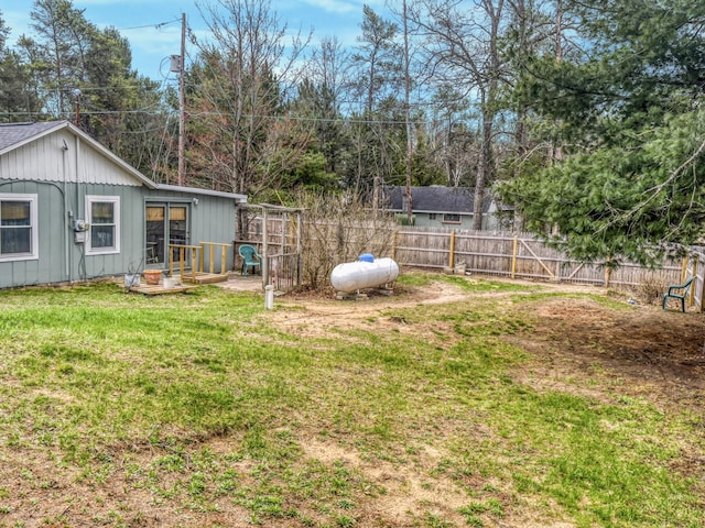 view of yard with a fenced backyard
