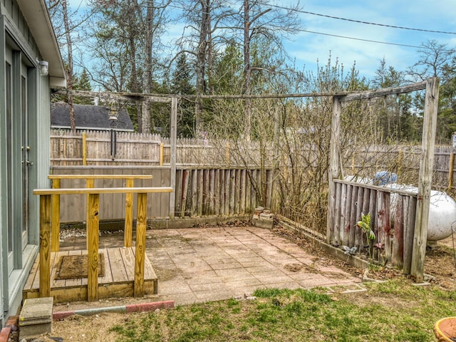 view of yard featuring a patio and fence