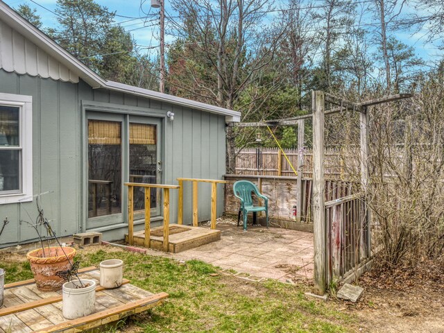 view of yard with fence and a patio area