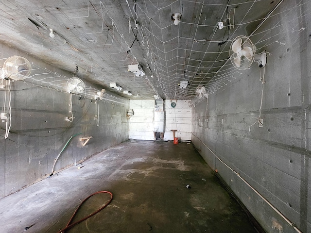 below grade area featuring water heater