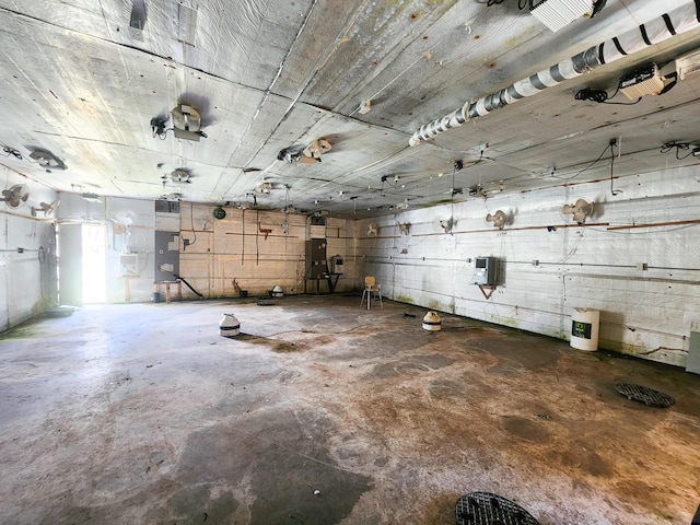 misc room featuring unfinished concrete floors