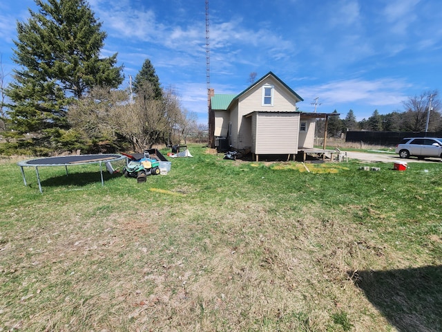 view of yard featuring a trampoline