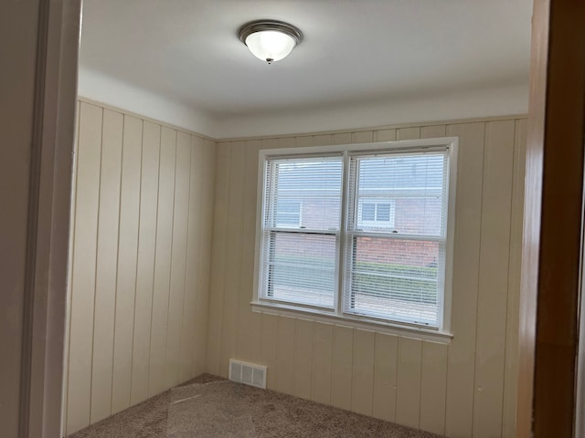 20950 Norwood Dr, Harper Woods, MI 48225 - carpeted spare room featuring plenty of natural light and visible vents