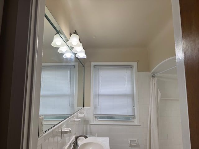 20950 Norwood Dr, Harper Woods, MI 48225 - full bath with a sink, a wainscoted wall, a shower with shower curtain, and a notable chandelier
