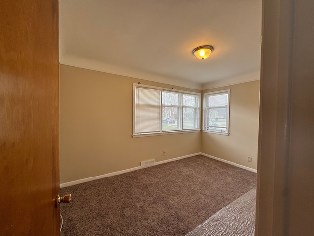 20950 Norwood Dr, Harper Woods, MI 48225 - spare room with visible vents, baseboards, and carpet floors