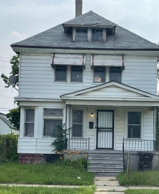 3015 Van Dyke St, Detroit, MI 48214 - traditional style home featuring a chimney, a high end roof, and covered porch