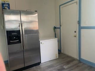 3015 Van Dyke St, Detroit, MI 48214 - laundry area with wood finished floors