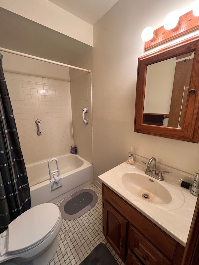 full bathroom featuring vanity, tile patterned floors, shower / bath combo, and toilet