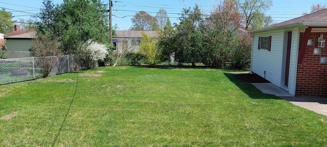 view of yard with fence