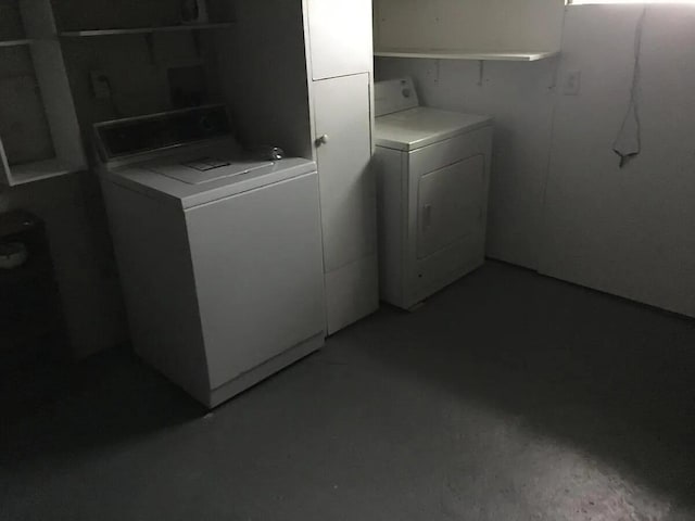 laundry area with washing machine and dryer