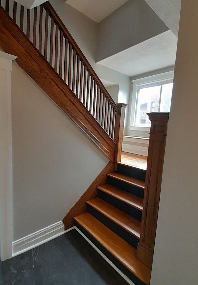 728 W Philadelphia St, Detroit, MI 48202 - stairs featuring concrete flooring and baseboards