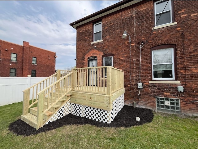 728 W Philadelphia St, Detroit, MI 48202 - rear view of property featuring brick siding and a wooden deck