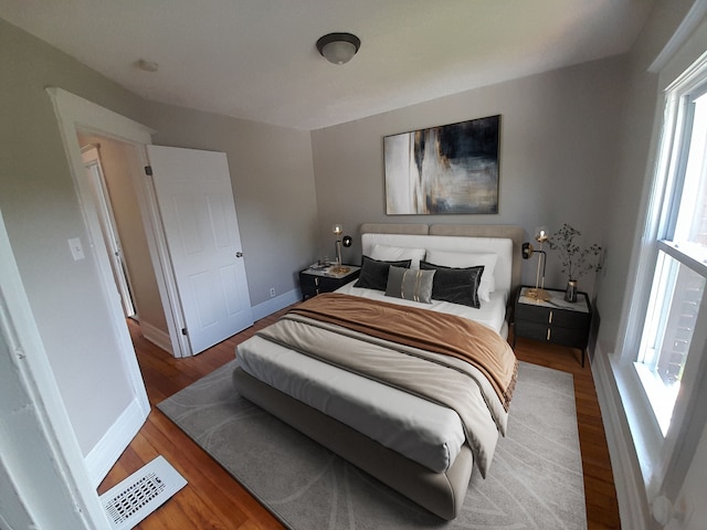 728 W Philadelphia St, Detroit, MI 48202 - bedroom with wood finished floors and baseboards