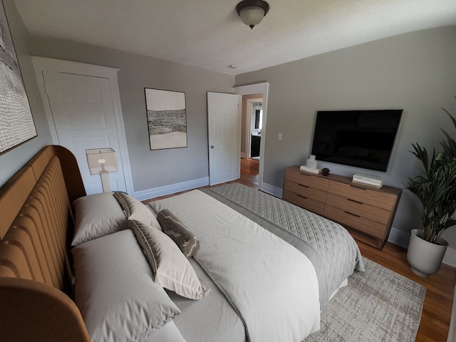 728 W Philadelphia St, Detroit, MI 48202 - bedroom featuring wood finished floors and baseboards