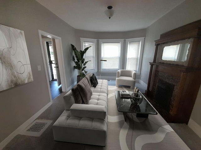 728 W Philadelphia St, Detroit, MI 48202 - living room featuring a fireplace and baseboards