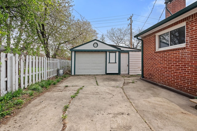11394 Centralia, Redford, MI 48239 - detached garage featuring fence and concrete driveway