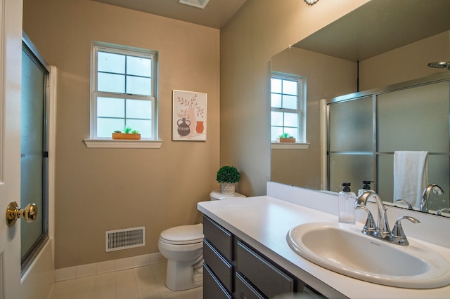 8313 Mill Pointe Ct, Goodrich, MI 48438 - bathroom with vanity, toilet, baseboards, bath / shower combo with glass door, and tile patterned floors