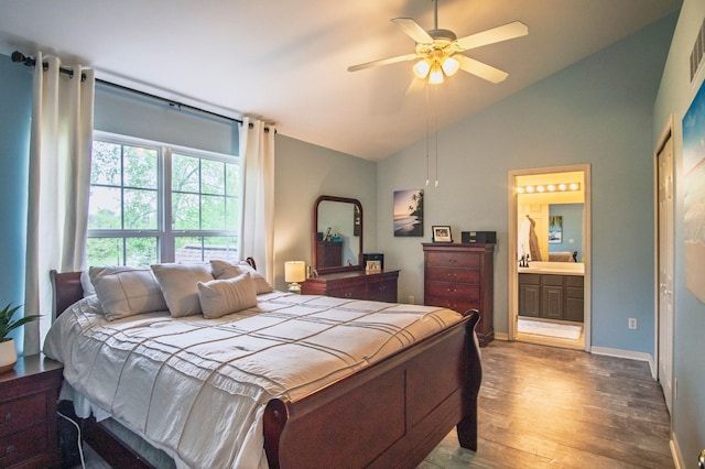 8313 Mill Pointe Ct, Goodrich, MI 48438 - bedroom featuring wood finished floors, connected bathroom, a ceiling fan, baseboards, and high vaulted ceiling